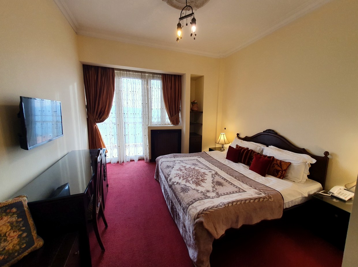 Chambre King au Quartier Suisse Hotel